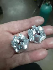 Billet Aluminum Spindle Nut. TRX450R, YFZ450, Banshee, Raptor 700, Lt500, Z400