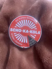 Empty Red Scho-Ka-Kola Tin