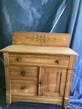 This is an Eastlake antique dry/sink. The wood is oak & in good shape