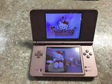 New ListingNintendo DSi XL Metallic Rose Handheld System W/3 Games, Charger