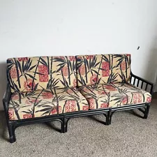 Boho Chic Black Wicker Rattan Sofa With Tan Red and Black Cushions