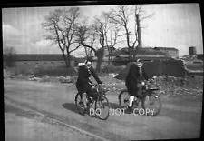 N429 1940S NEGATIVE...STREET,FRENCH WOMEN RIDING BICYCLES WORLD WAR 2 FRANCE