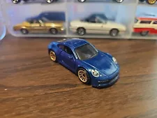 Matchbox Moving Parts Porsche 911 Carrera 4s Blue