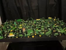 ertl john deere die cast tractors and pull behind accessories used