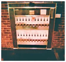 Vintage Cigarette Vending Machine still. Fully operational with blue backlight