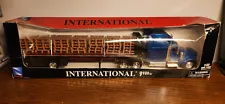 NewRay International 9900ix Semi /Flatbed Trailer and Pallet Load 1:32