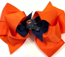 Beautiful Chicago Bears inspired hair bow for girls.