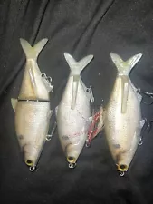 (2) Fish 30 Acre Discontinued 4.25 Shooter Shad 1) Fish 30 acre Z5 Glide Bait.