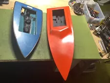 2 RC Boat Hulls Set up with Pump Drives