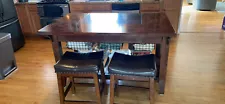 kitchen island with bar stools