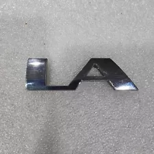 2002-2014 Cadillac Escalade Nameplate Emblem Single Letter "LA" (USED) Chrome