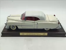 1953 Cadillac Eldorado Convertible by Danbury Mint on wood stand, 1:16 scale