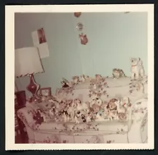 Steiff Stuffed Animal Collection Displayed on Sofa 1960s Photo Abstract Surreal