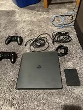 BRAND NEW ps4 for sale NEVER USED! including controller with charge, and 1 tb