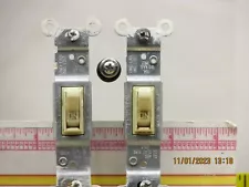 For Sale (2) used Leviton Single-Pole Toggle Light Switches-Ivory 15A-120V