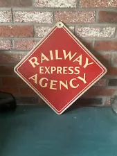 Original Railway Express Agency Sign…metal frame bordering wood/masonite