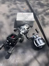 Daiwa Fuego & (2) Team Daiwa Advantage Baitcasting Fishing Reels