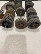 For sale an assortment of used TONKA truck tires and axles