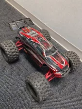 Traxxas E-Revo Brushless UPGRADED/ARMS/BADLAND TIRES