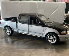 ERTL AMERICAN MUSCLE 2003 HARLEY DAVIDSON 100th SUPER CREW F150 PICKUP 1:18