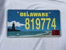 Delaware License Plate Tag Beach Scene with Lighthouse Jan 2000 Sticker