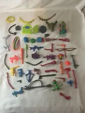 Teenage Mutant Ninja Turtles Accessories Lot Of 50 Pc TMNT Belts Weapons Cases