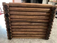 Lincoln Logs with smooth wall and no inside notches.