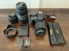 Canon EOS Rebel SL1 SLR Camera w/EFS 18-55mm & EF 75-300mm & EF 50mm f/1.8 STM