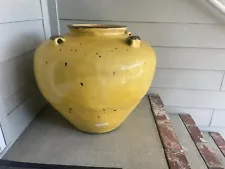 large yellow terra cotta pot