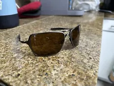 Oakley Inmate Sunglasses Brushed Chrome Dark Bronze Lens Lifestyle