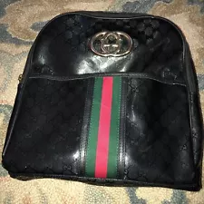 Black Gucci Backpack With Green And Red Straps, Gold Colored Hardware.