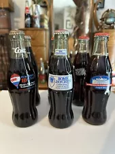 This Sale Is For 6 Different Very Sought After 8oz Coca Cola Bottles