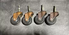 Set of 4 Antique Vintage Brass Casters, 2” diameter wheels and 1 1/2” stem.