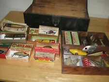 Antique fishing tackle box full of old lures some with boxes