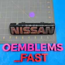 1985 Nissan B720 Pickup OEM Front Grille Grill Emblem Chrome Mount Badge Plate