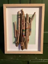 Handcrafted Driftwood Art with Colorful Thread Accents - Framed