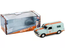 1968 Chevrolet C-10 Pickup Truck Light Blue with Orange Stripes with Camper Shel