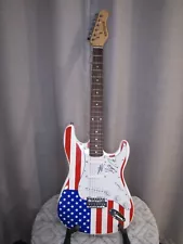 LoCash autographed electric USA Flag guitar with Certificate of Authenticity