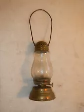 Antique Brass Skaters Oil Lamp