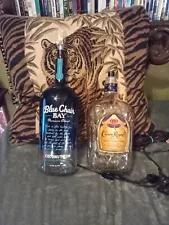 Very cool,fun,liquor bottle empty large homemade lamps,both work.