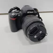 BLACK NIKON CAMERA