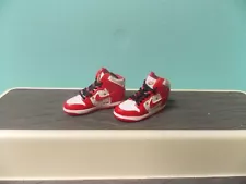 Nike miniature 2” Hard plastic red sneakers