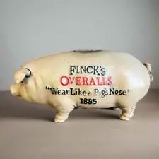 Finck's Overalls 1885 Cast Iron Coin Bank With Raised Lettering Antique Finish