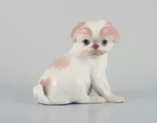 Dahl Jensen for Bing & Grøndahl, porcelain figurine of a Pekingese puppy.