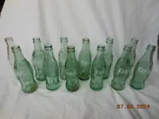 Lot of Vintage Coke Bottles