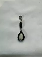 Black Agate Surrounds Opal Pendant