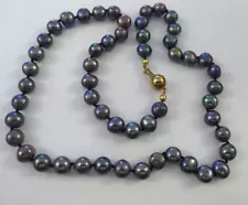 GENUINE STRING OF BLACK PEARLS SECURELY KNOTTED HAS 585 (14K) GOLD MARK ON CLASP