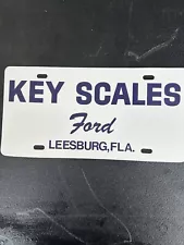 New ListingKey Scales Ford LEESBURG FL FLORIDA Dealership License Plate Booster