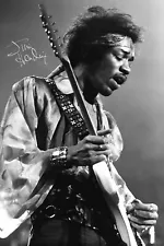 JIMI HENDRIX - Framed Photo Pre-Printed Autograph Signature. (047FP) (12” x 16”)