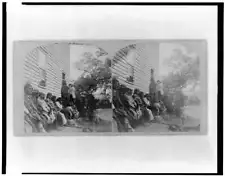 Group of Winnebago Indians seated on bench outside of building c1900 Old Photo